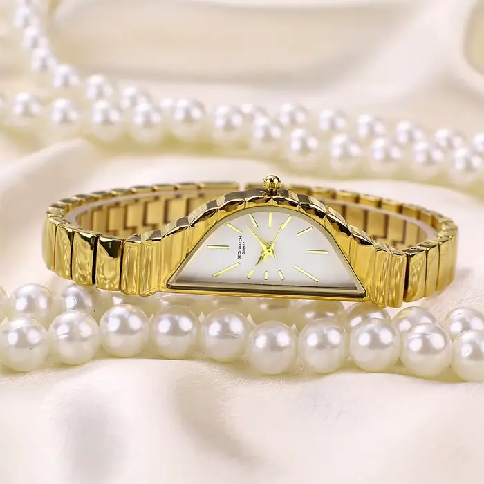 GEDI exquise minimaliste lumière luxe montres en or pour les femmes Niche conception irrégulière artistique Quartz femme montre cadeaux