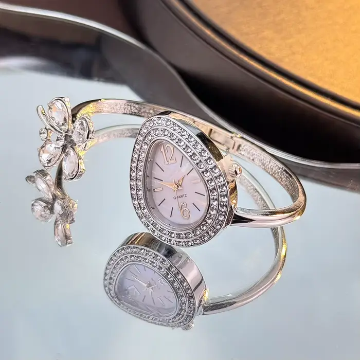 Montre à Quartz pour femmes, trèfle à quatre feuilles, goutte d'eau, Bracelet à poignée ouverte, hau