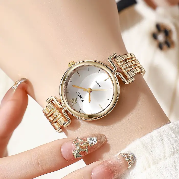 Montre élégante pour femme avec bracelet en acier inoxydable, quartz, design simple et résistant aux chocs pour toutes les occasions