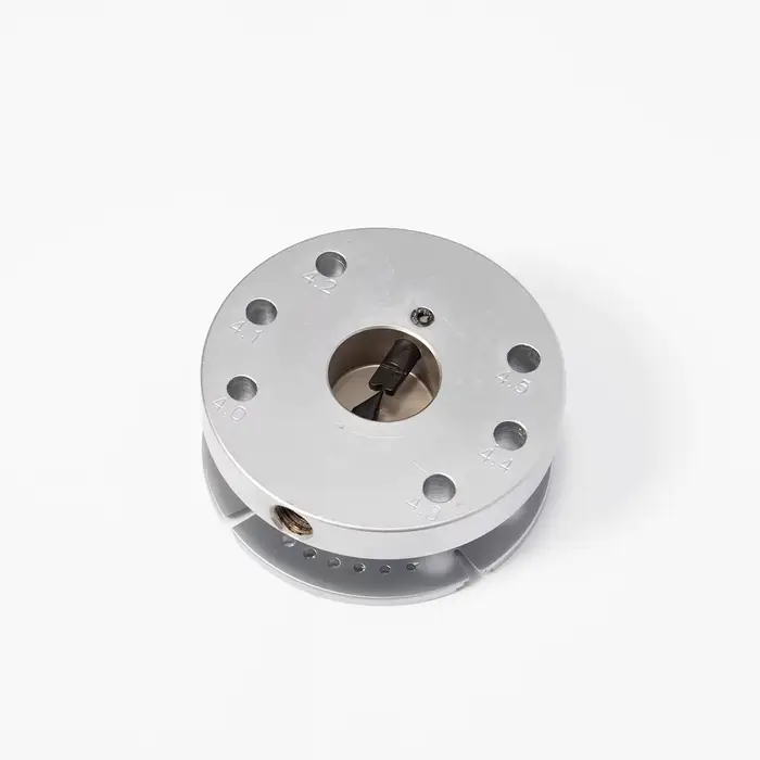 Outil de réparation de montres brun pour horlogers professionnelles et amateurs pour le retrait et installation de l'arbre de balancier de montres usages spéciales