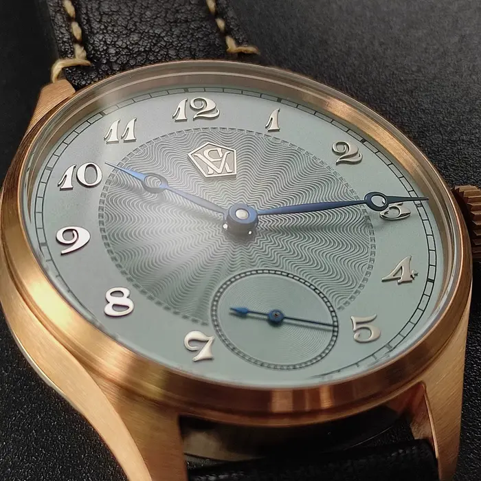 Montre mécanique manuelle Cronos avec boîtier en étain bronze guilloché pour hommes élégance quotidienne et occasions spéciales
