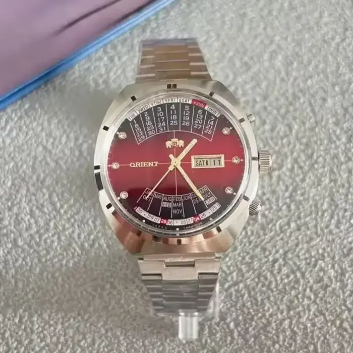 Montre automatique mécanique unisexe Orient 118A avec grand cadran rotatif