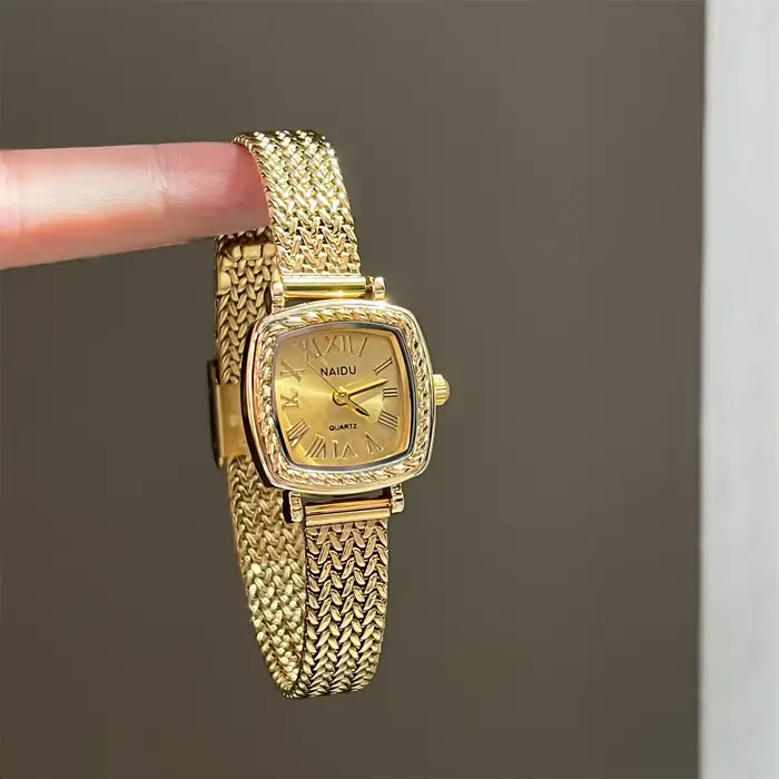 Montre pour femme carrée romaine dorée