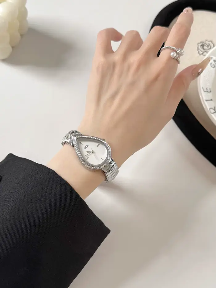 GEDI Nouvelle montre créative vintage pour femme avec cadran en forme de larme clouté de diamants