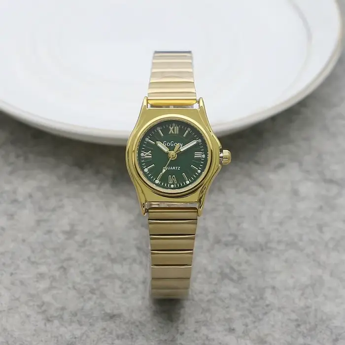 Montre en or vert émeraude