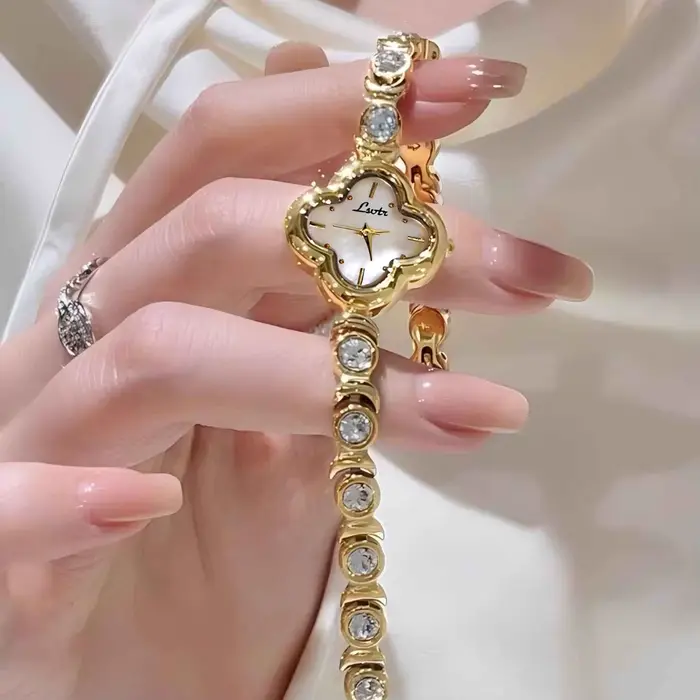 1 nouvelle montre pour femme en or