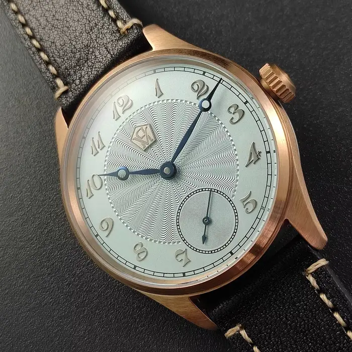 Montre mécanique manuelle Cronos avec boîtier en étain bronze guilloché pour hommes élégance quotidienne et occasions spéciales
