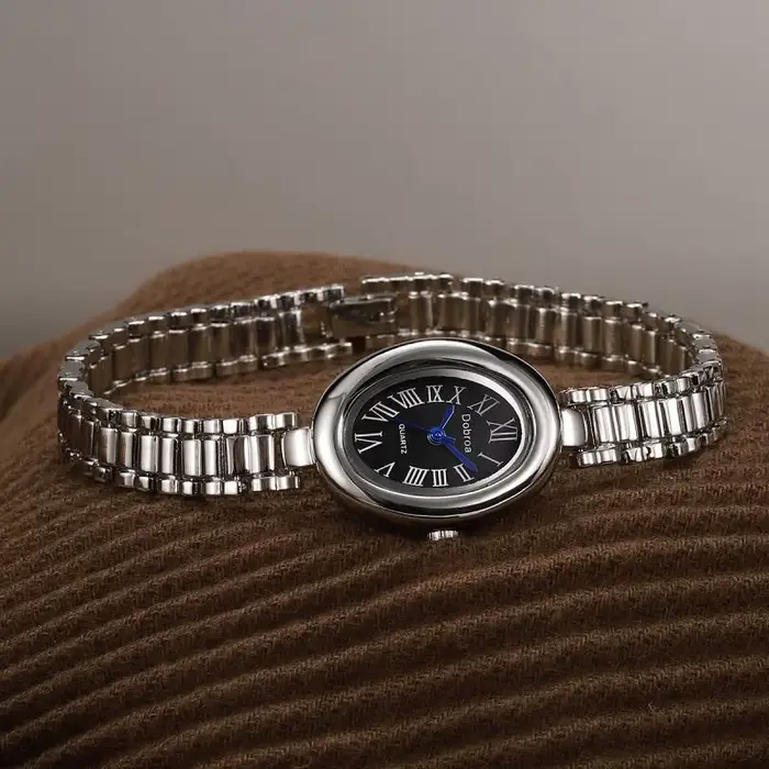 Montre femelle ceinture en acier haute beauté ovale baignoire quartz simple grosses montres bracelet occasions spéciales