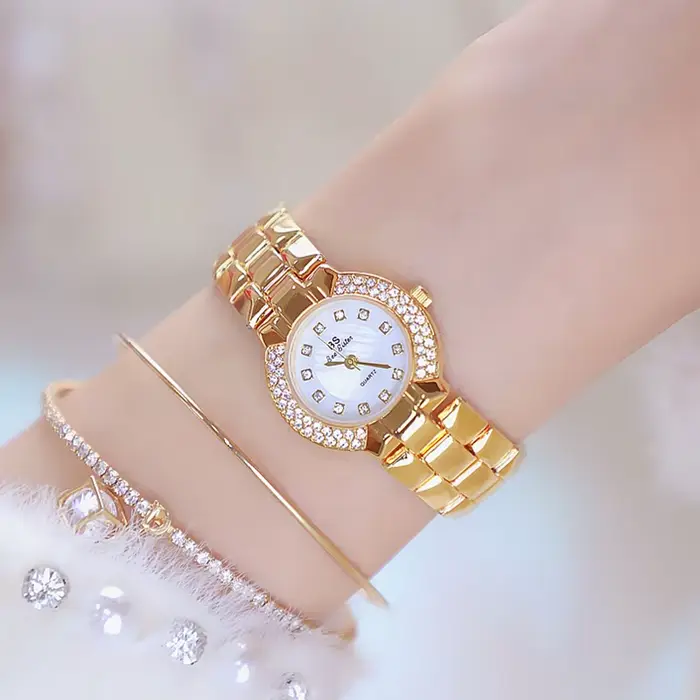 Montre de luxe pour femmes en argent et or avec mouvement quartz résistante à l'eau pour occasions spéciales et quotidien