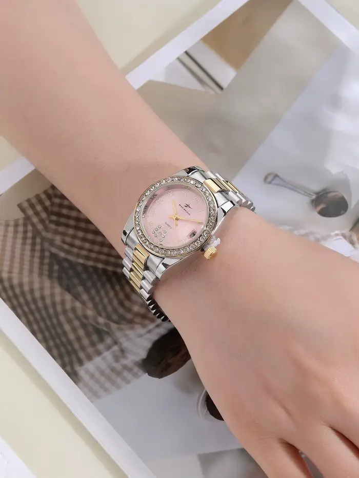 Montre à quartz de luxe pour femme bracelet en acier inoxydable bicolore lunette sertie de strass cadran à chiffres romains avec affichage de la date pour femmes occasions spéciales