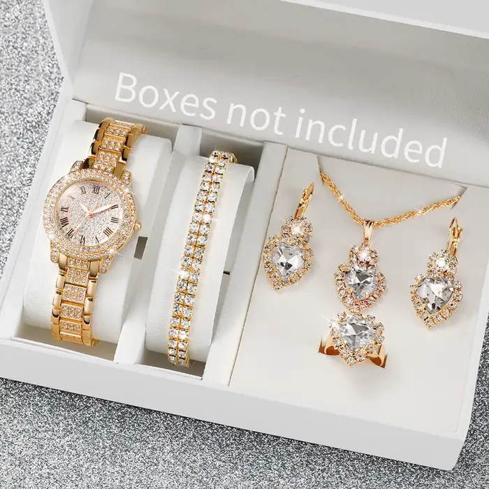 Montre à quartz sertie de diamants pour femme bracelet en acier doré élégante pour toutes les occasions style fashion casual