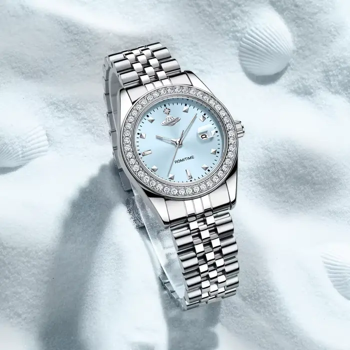 Montre à Quartz Luxe Femmes Planète Collection Calendrier Lumineux Bracelet Acier Occasions Spéciales Robuste et Élégante