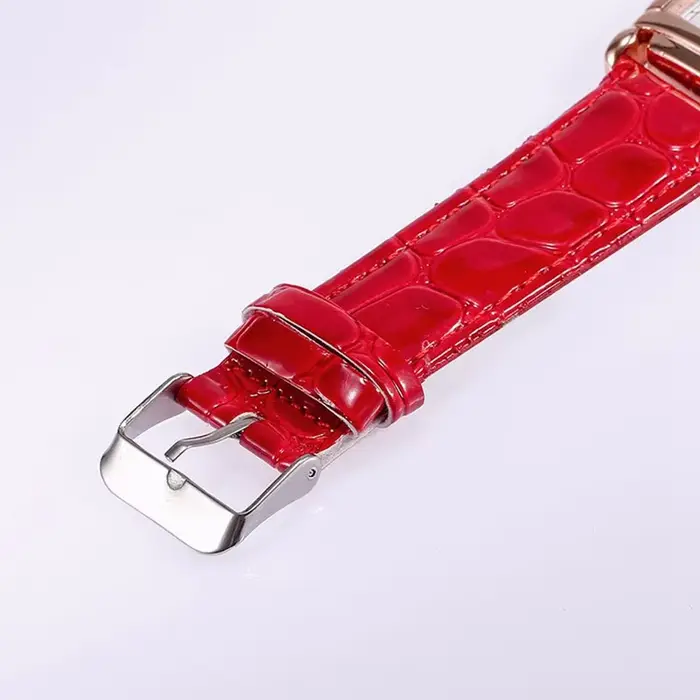 Montre JBAILI en acier inoxydable rose avec bracelet résistant à l'eau pour femmes occasions spéciales simple et élégante quartz