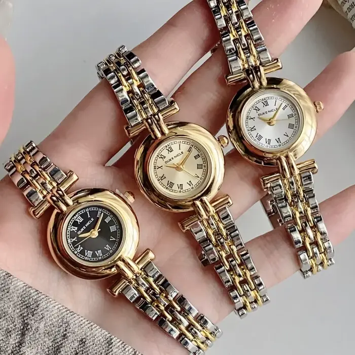 Montre KCALOE Cadran Romain Bracelet Acier Inoxydable Femmes Occasions Spéciales Quartz Bronze Café Rose Multicolore