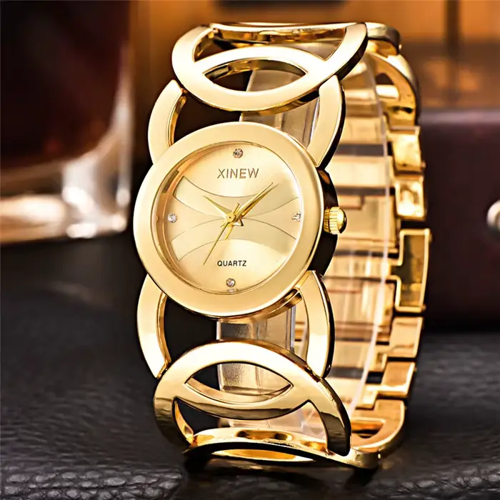 Montre de luxe XINEW en acier inoxydable avec mouvement à quartz pour femmes, élégante et résistante, idéale pour les occasions spéciales et le quotidien