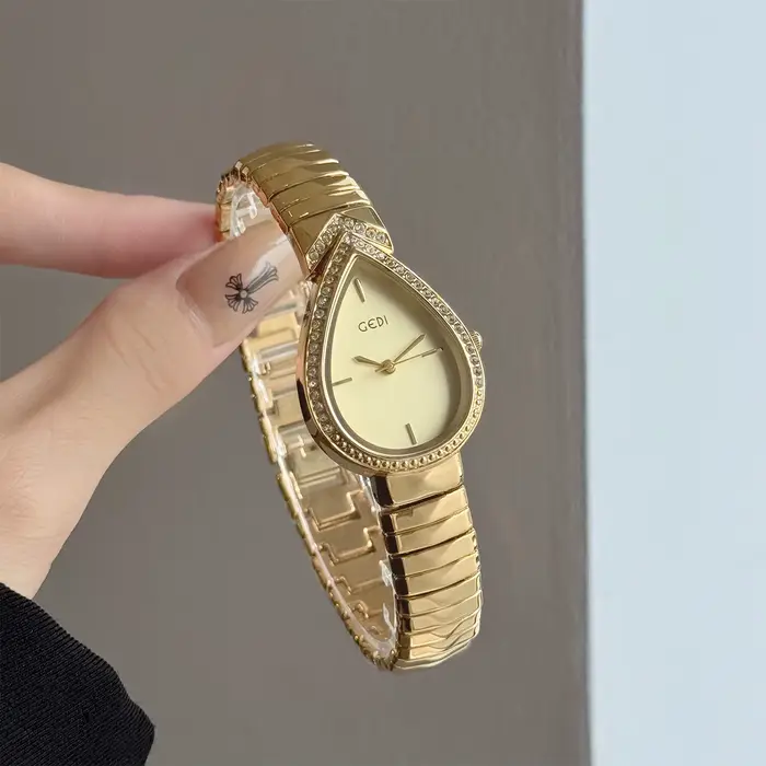 GEDI Nouvelle montre créative vintage pour femme avec cadran en forme de larme clouté de diamants, d