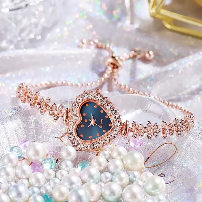 Montre à quartz à cadran en forme de cœur pour femme