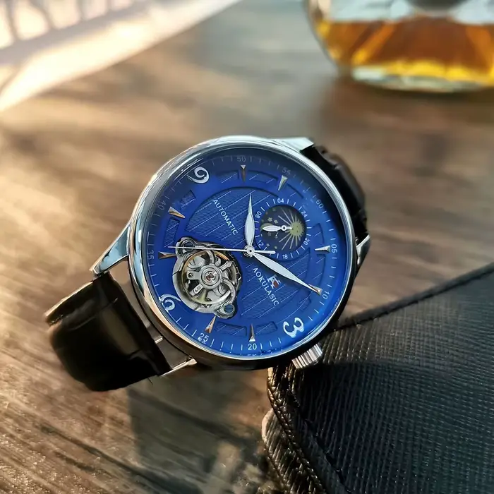 Montre mécanique de luxe AOKULASIC avec cadran squelette et bracelet en cuir pour homme style business occasions spéciales