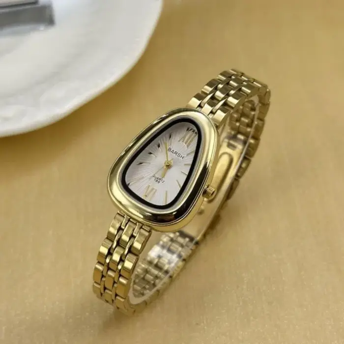 Marque serpent tête cadran femmes montre de luxe dames montres à Quartz en forme de gouttelette chiffre romain bracelet