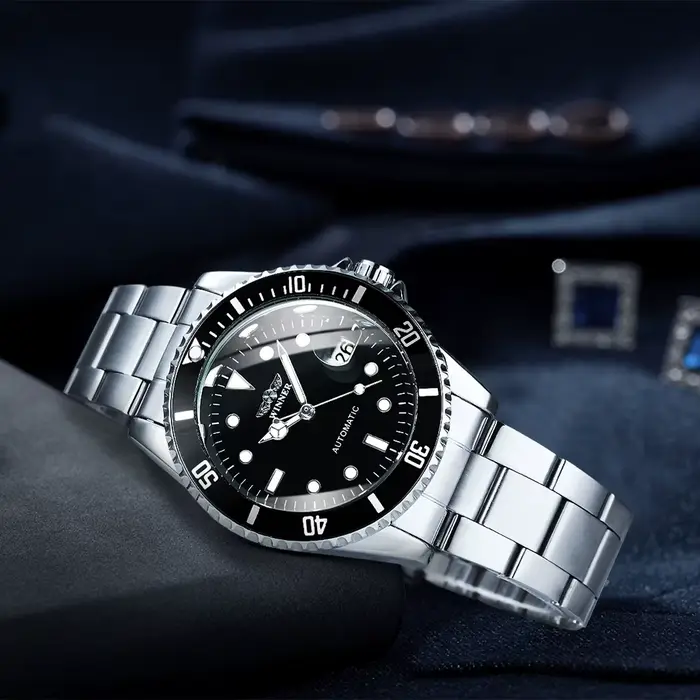 Montres mécaniques T-WINNER pour hommes avec mouvement automatique, résistance à l'eau, lunette rotative et bracelet en acier inoxydable pour occasions spéciales