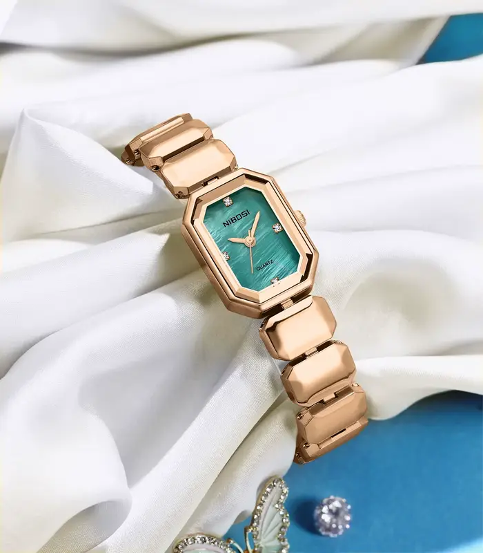 Montre NIBOSI en acier inoxydable simple et élégante pour femmes occasions spéciales romantique cadeau quartz robuste
