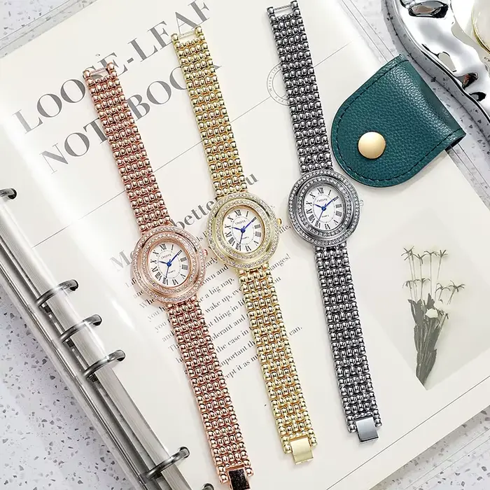 Nouvelle Montre Femme Tendance Cadran Diamanté Forme Œuf de Pigeon