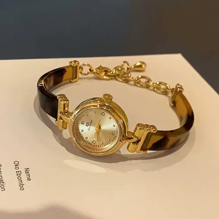 Montre féminine BS bee sister en résine imitation écorce de tortue dorée avec mouvement quartz pour occasions élégantes et quotidiennes