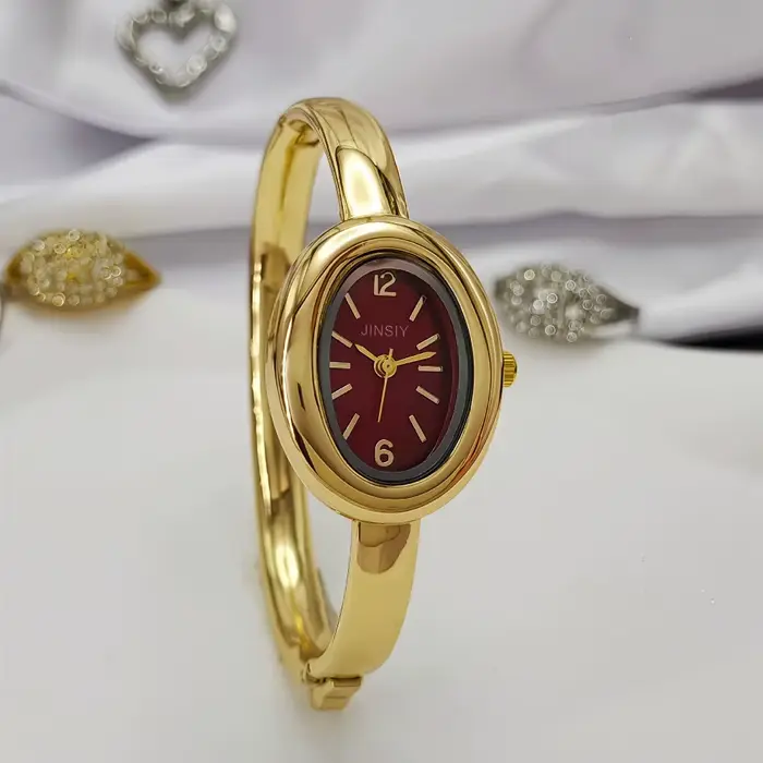 Montre-bracelet dorée en alliage avec bracelet en acier inoxydable pour femmes élégantes occasions spéciales style mode et décontracté