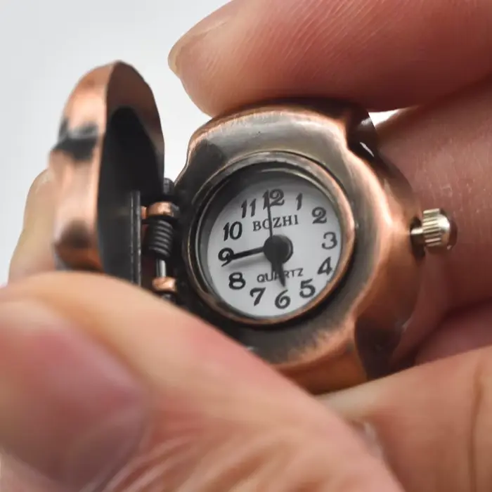 Montre à quartz à cadran circulaire en alliage unisexe