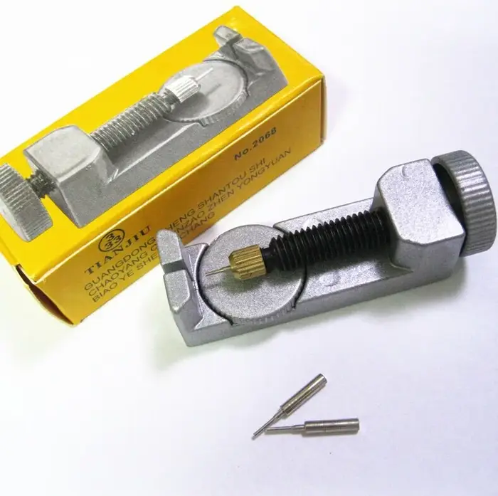 Ajusteur de bracelet de montre avec goupille