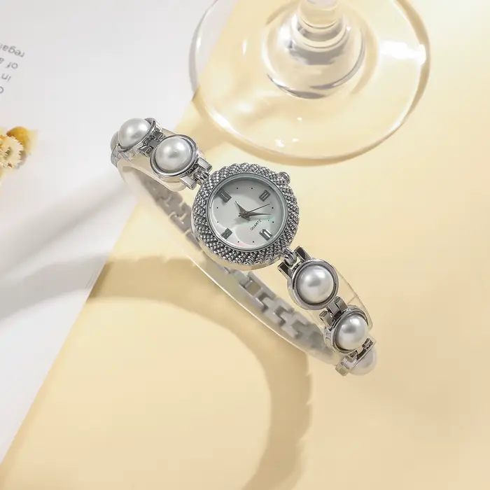 Nouvelle Montre Bracelet Élégante en Perles pour Femme