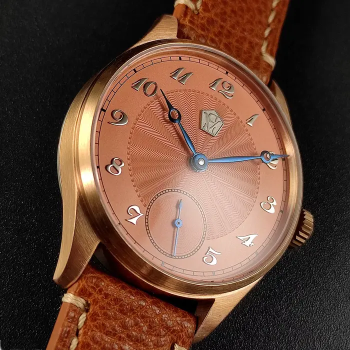 Montre mécanique manuelle Cronos avec boîtier en étain bronze guilloché pour hommes élégance quotidienne et occasions spéciales