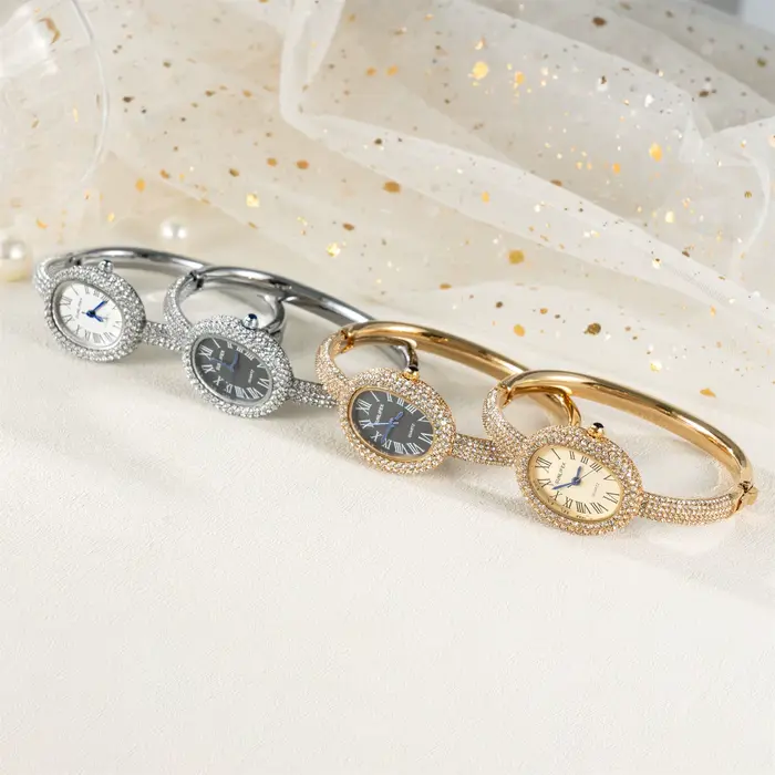 Montre de luxe ovale en cristal pour femmes
