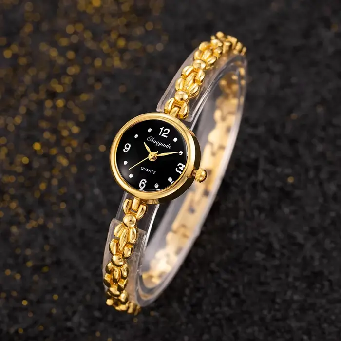 Montre TINUORA Femme Luxe Alliage Doré Élégante Quartz Occasions Spéciales