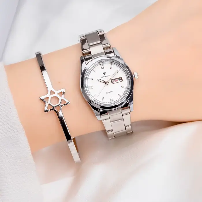 Montre à quartz étanche pour femme, date automatique, résistance à l'eau, bracelet en acier inoxydable, élégance et praticité pour toutes les occasions