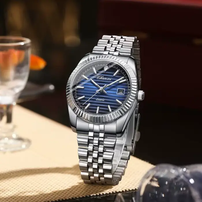 Montre en acier inoxydable avec calendrier complet et résistance à l'eau pour homme style décontracté occasions quotidiennes et spéciales