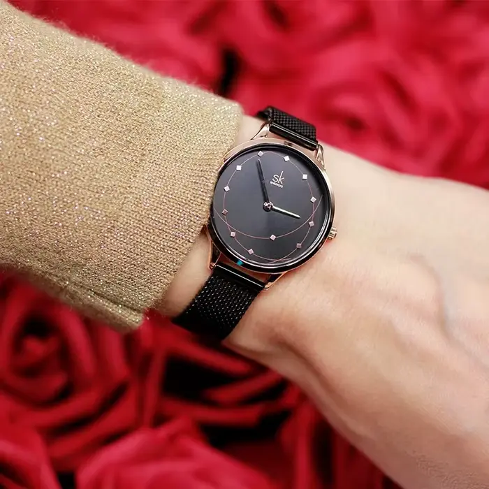 Montre femme quartz élégante résistante à l'eau et aux chocs pour toutes occasions cadeau style fashion et casual