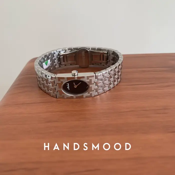 Montre en argent avec bracelet en acier inoxydable pour femme
