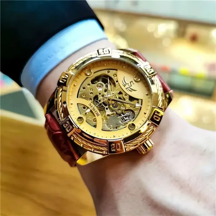 Montre mécanique AOKULASIC automatique pour homme élégante avec bracelet en cuir ajouré résistante à l'eau et boîtier en alliage tendance pour toutes les occasions