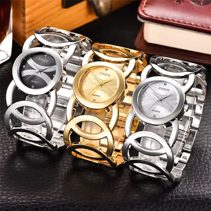 Montre de luxe XINEW en acier inoxydable avec mouvement à quartz pour femmes, élégante et résistante, idéale pour les occasions spéciales et le quotidien