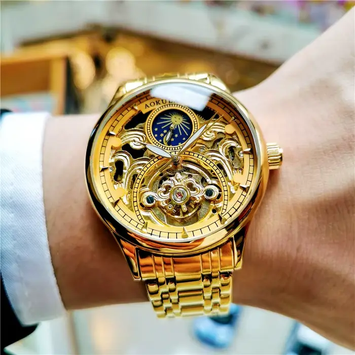 Montre automatique vintage en or homme phase de lune tourbillon squelette aiguilles lumineuses bracelet acier occassionnels spéciaux