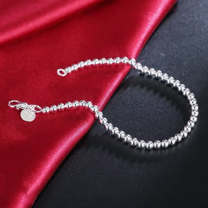 Bracelet à breloques en argent regardé 925 pour femme