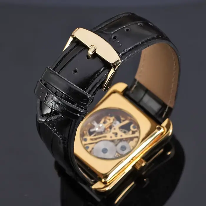 Montre mécanique manuelle de luxe pour homme design rectangulaire ajouré bracelet en cuir haut de gamme et tendance montre élégante et stylée de style urbain occassions formelles et informelles