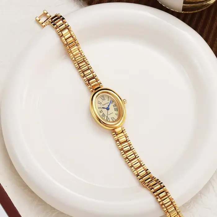Montre femelle ceinture en acier haute beauté ovale baignoire quartz simple grosses montres bracelet occasions spéciales