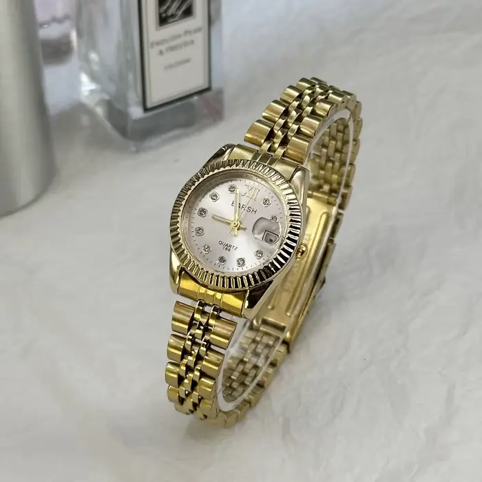 Bande d'acier dorée montre pour femme diamant clouté calendrier montre décontracté dames montre à Qu
