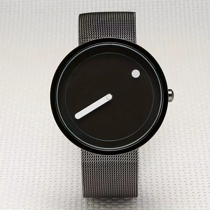 Montre au design minimaliste à pois avec une valeur esthétique élevée