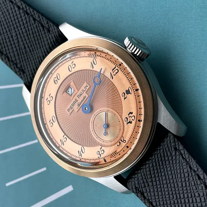 Montre Merkur en acier inoxydable avec anneau en bronze vintage cadran saumon pour hommes occasions spéciales