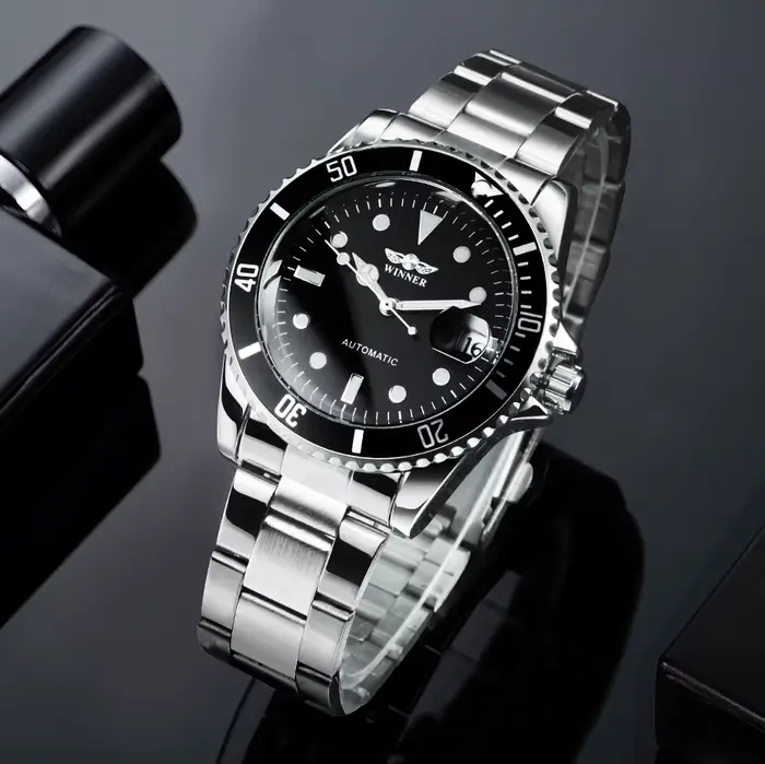 Montres mécaniques T-WINNER pour hommes avec mouvement automatique, résistance à l'eau, lunette rotative et bracelet en acier inoxydable pour occasions spéciales