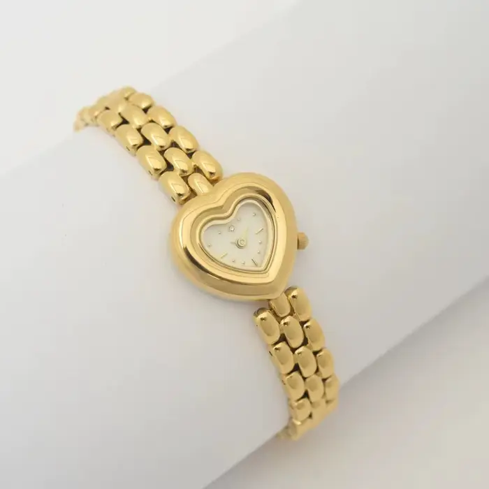 Montre Femme Luxe Or Cadran Cœur Mouvement Quartz Haute Qualité Occasions Spéciales