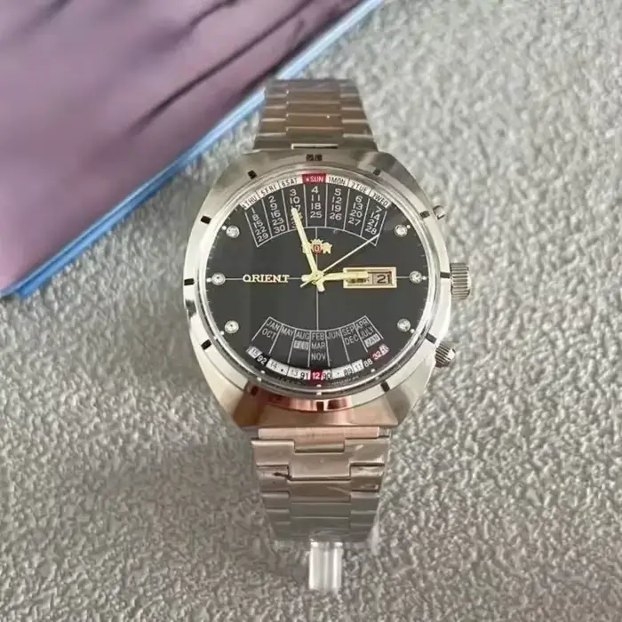 Montre automatique mécanique unisexe Orient 118A avec grand cadran rotatif